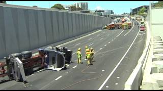 Truck and 40ft Swingloader and container overturns on motorway [upl. by Plotkin]