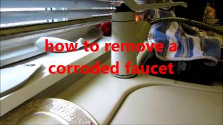 plumbing how to remove a corroded kitchen sink faucet [upl. by Retsae]