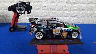 Unboxing Wltoys K989 Mini Car 4x4 Drift RC Scale 128 24G 4WD Car RTR Model Battery Lipo [upl. by Ynottirb]