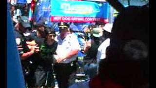 Kobayashi Arrested  Nathans hot dog eating contest [upl. by Ysus705]