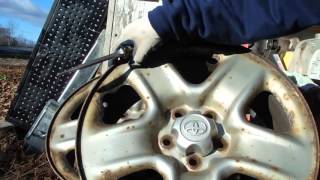 RAV4 Wheel Center Cap Removal [upl. by Elrebmik324]