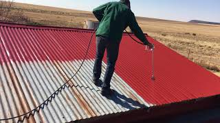 Airlessspray painting a roof [upl. by Nnylak]