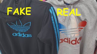 Real vs fake Adidas hoodie How to spot original Adidas hood jackets and sweatshirts [upl. by Lauhsoj]