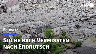 Suche nach drei Vermissten im Schweizer Hochwassergebiet  AFP [upl. by Suraved]