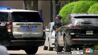 Suspect threatens to jump off building in Dallas during standoff [upl. by Onivla]