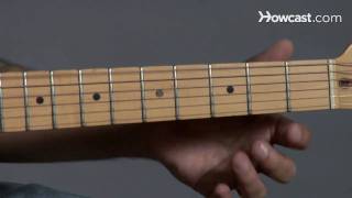 How to Tune a Guitar to Drop D  Guitar Lessons [upl. by Muhcan]