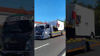 TRUK TOWING ISUZU MUATAN GENSET LISTRIK SANGAT BESAR MELAJU CEPAT shorts trending subscribe [upl. by Nanyt797]