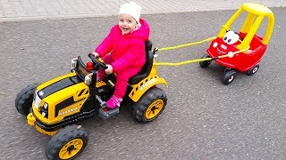 Little Girl Elis Ride On Tractor with Cozy Coupe Little Tikes with Baby Dolls Outdoor Activity [upl. by Sabelle]