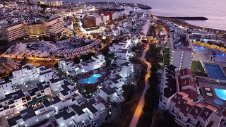 Drone view of resorts near Playa de Fanabe in Costa Adeje Tenerife Canary Islands [upl. by Schreiber191]