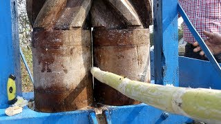 Wooden Crushed Sugarcane Juice  Sugarcane Juice Freshly Made the Ancient Way  Oldest Streetfood [upl. by Aynom402]