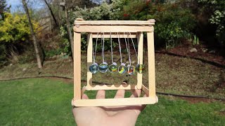 How to make Newtons Cradle using popsicle sticks and marbles  X Workbox [upl. by Debera334]