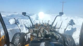 Plowing snow in a road grader [upl. by Goggin]