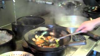 Cooking How to use a Chinese wok [upl. by Ahsitahs176]