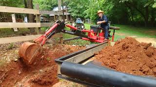 Harbor Freight towable trencherbackhoe loading a trailer Double M Farm Homestead [upl. by Uohk]