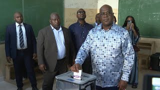 DR Congo President Felix Tshisekedi votes in Kinshasa  AFP [upl. by Maxa]