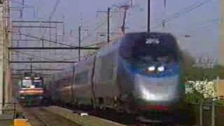 Neck and Neck Acela Express races Amtrak Metroliner Amtrak Northeast Corridor Croydon PA May 1 2001 [upl. by Cristine]