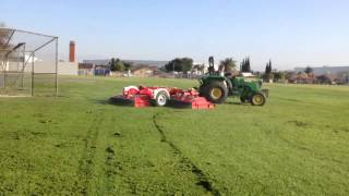 Trimax Pegasus 16 wing mower on a John Deere 5065M [upl. by Eenitsed]