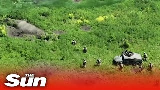 Incredible video shows Ukrainian soldiers in Humvees storming Russian trenches [upl. by Safoelc]