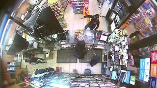 RAW Sheriffs deputy walks into 7Eleven during armed robbery in progress [upl. by Aduhey544]