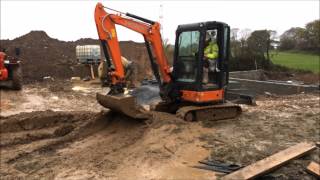 Mini Excavator working with very wet mud [upl. by Retniw]