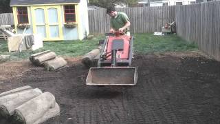 Moving Sod with a Mini Skid Steer [upl. by Enniotna]