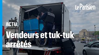 Tuktuk et vendeurs à la sauvette contrôlés lors dune opération de police au pied de la tour Eiffel [upl. by Ilac503]