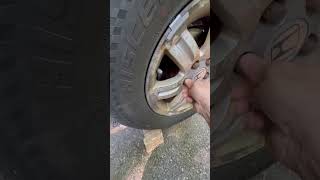 Loosening lug nuts after you lifted your car [upl. by Card]