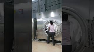 Industrial tumble dryer unloading process Effective tools and machinery simplify work [upl. by Gratt]