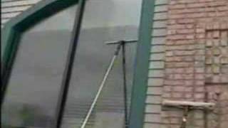 Watch and LearnCleaning tall windows with reach pole [upl. by Ahterod]