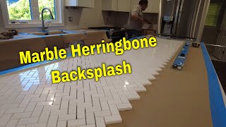 Marble mosaic Herringbone backsplash Install Time lapse [upl. by Lagas]