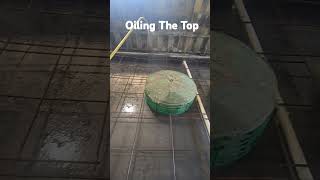 Oiling septic tank lid before pouring concrete [upl. by Fredenburg140]