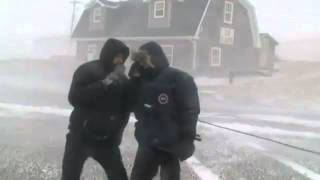 Reporters fall lose microphone during live blizzard update [upl. by Iolanthe330]