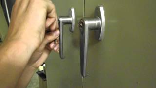 Picking the lock on a file cabinet with a bobby pin [upl. by Henryson306]