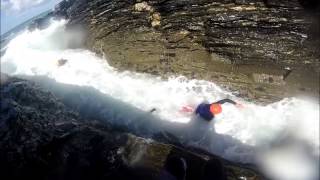 Coasteering in huge swell near Penzance Cornwall  Kernow Coasteering [upl. by Shanney766]