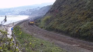 Mr Floyd amp D1015 FULL SALUTE absolute storm of Dawlish sea wall 16th May 2010 [upl. by Ecinej47]