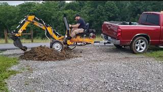 Adding a culvert pipe to the driveway digging it put with my towable backhoe trencher from betstco [upl. by Aienahs]