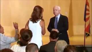 SyrianAramean Woman Defaces US Senator McCain At Town Hall 09052013 [upl. by Anauqaj]