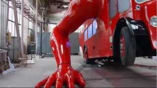 London doubledecker bus does pushups in preparation for Olympics [upl. by Ennairod]