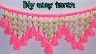 Easy woolen toran  Diy woolen toran Door hanging craft [upl. by Ebarta]