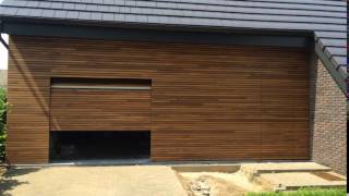 Afrormosia Houten Garagedeur met Gevelbekleding  Different Doors [upl. by Atinhoj]