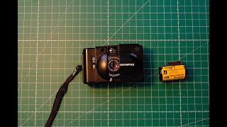 How to Load 35mm Film in a Olympus XAXA2XA3XA4 Rangefinder [upl. by Giselbert258]