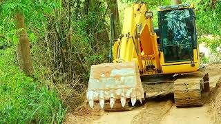 AX Excavator 130 PC and Abul push to clear the road [upl. by Akkim361]