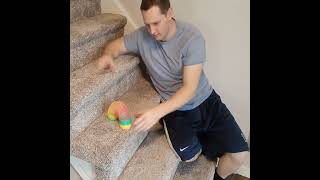 Trick to Get a Slinky to go down the Stairs shorts [upl. by Ariem973]