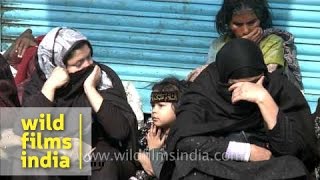 Shia women cry as the Muharram procession passes through [upl. by Tracay648]