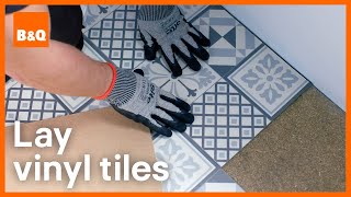 How to install vinyl tile flooring  DIY [upl. by Yelad25]