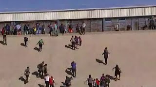 Migrants Storm US Border  MSNBC [upl. by Adnimra]